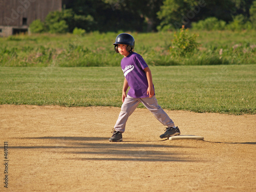 young baseball player on second base