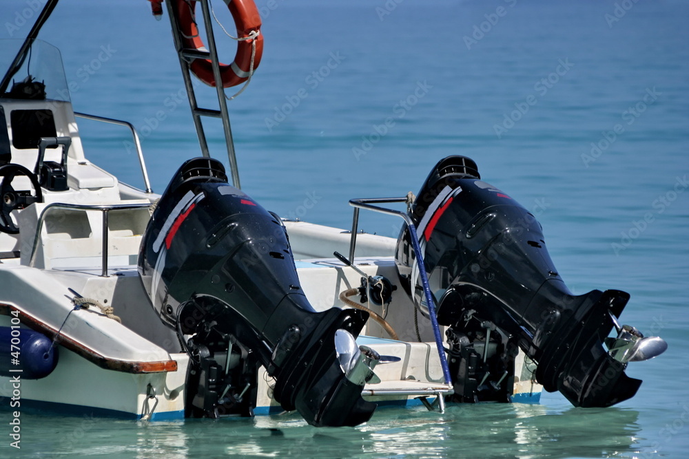 The outboard  engines of speedboat.