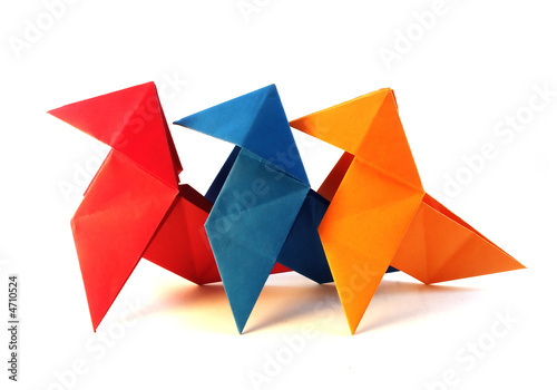 Paper cockerels. Isolation on a white background.