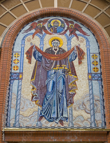 fresco over church entrance