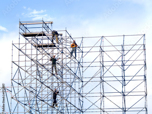 Obraz na plátně Steeplejacks on a scaffold