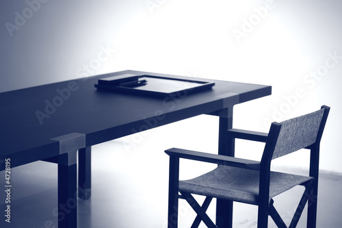 Easy-chair near Table