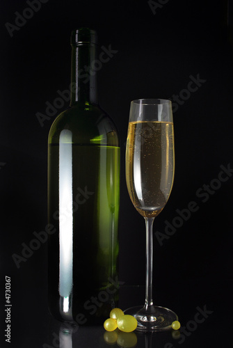  white wine glass and bottle