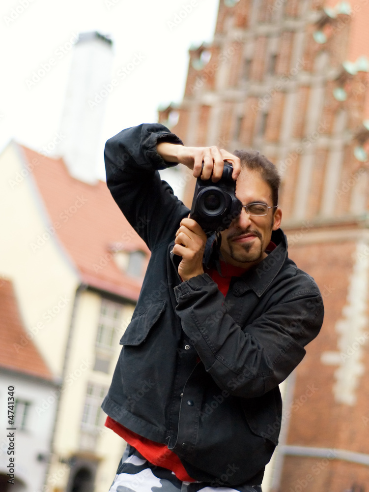 Handsome guy with a digital camera (shallow DoF) Handsome guy with a digital camera (shallow DoF)