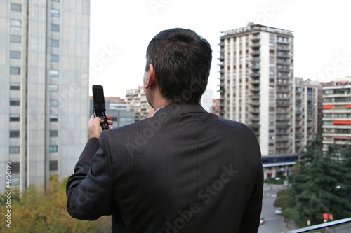Businessman dealing by mobile phone