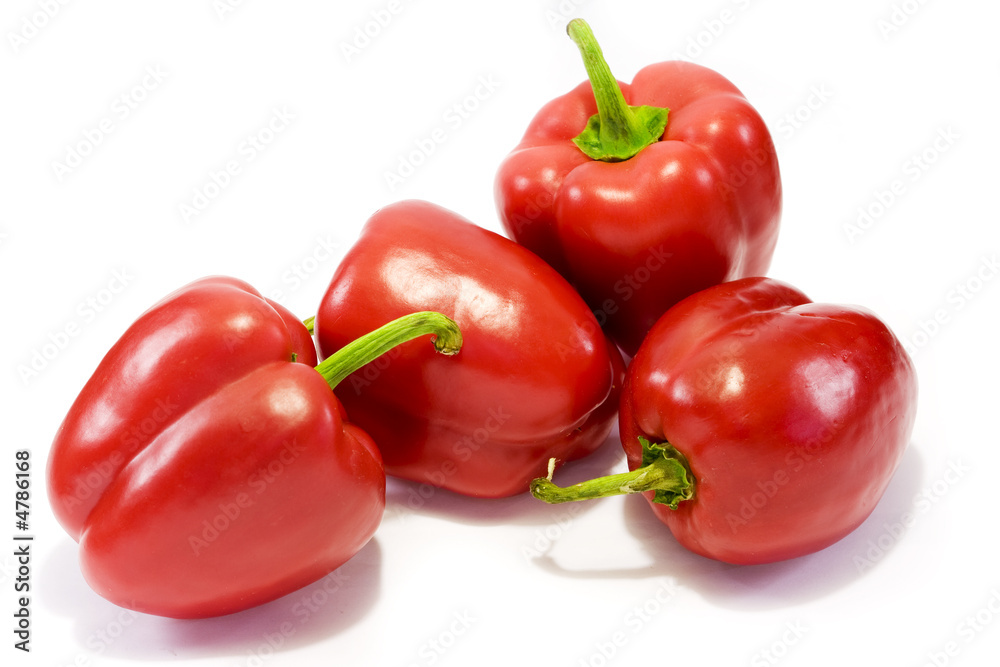 Red sweet bell peppers isolated on white background