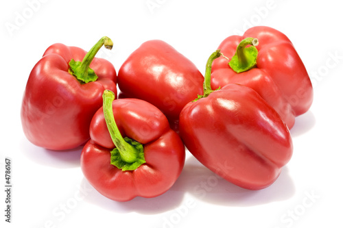 Red sweet bell peppers isolated on white background 2