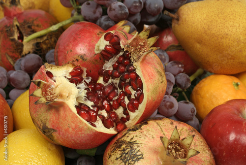 Juicy, ripe pomegranate and other fruit
