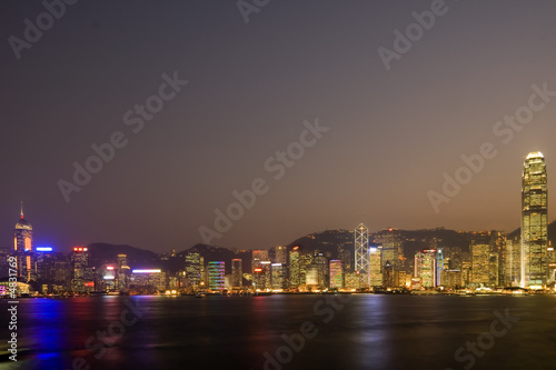 Skyline of Victoria Harbour in Hong Kong at dusk