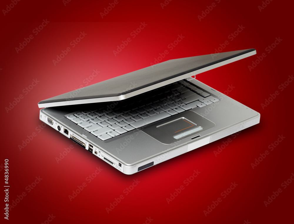 Laptop in red background Laptop in red background