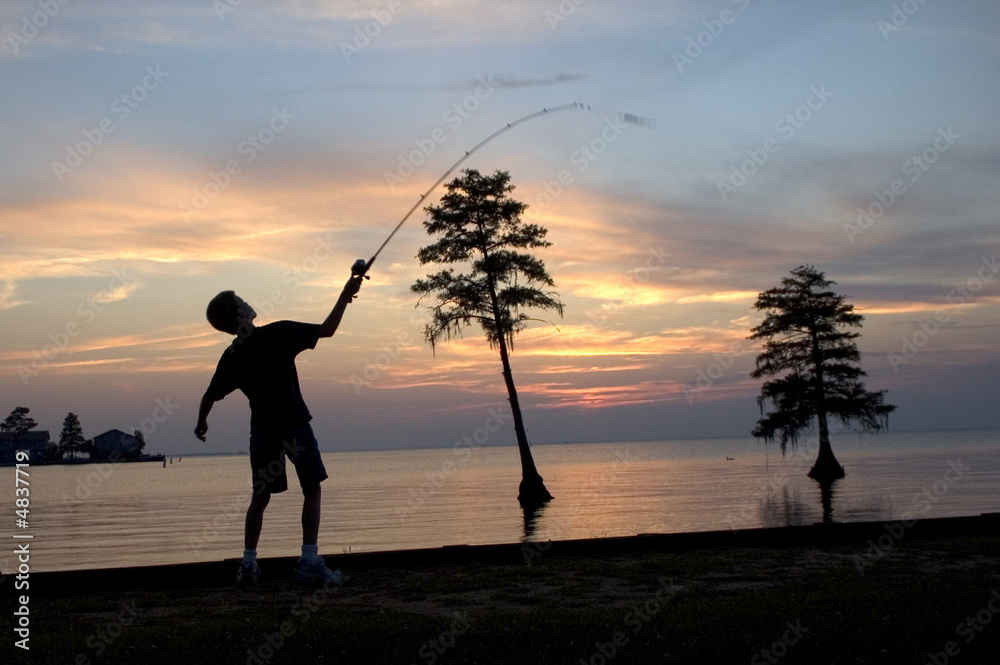 Boy Fishing on Lake