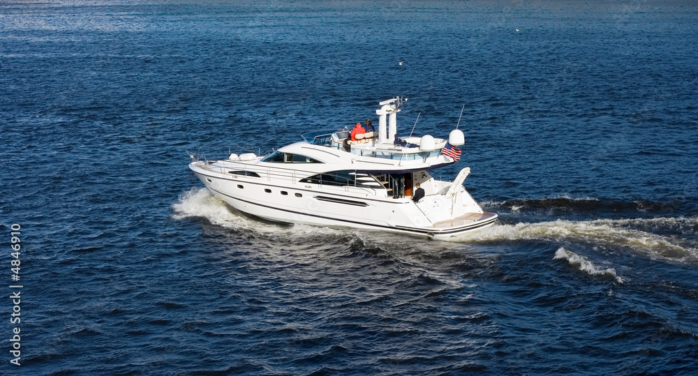 big giant two deck motor boat vacation trip at sea