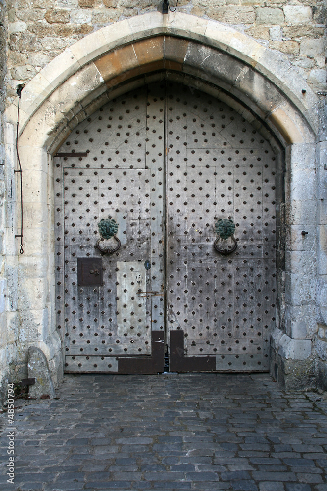closed studded castle door