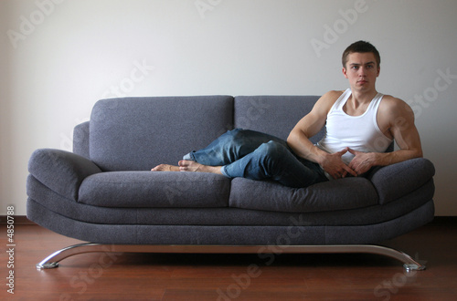 Sexy Man Lying on the Sofa