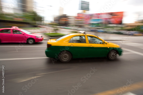Fast taxi in city traffic © Tommy Schultz