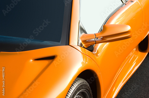 Vivid metallic orange Italian super car © Christopher Dodge
