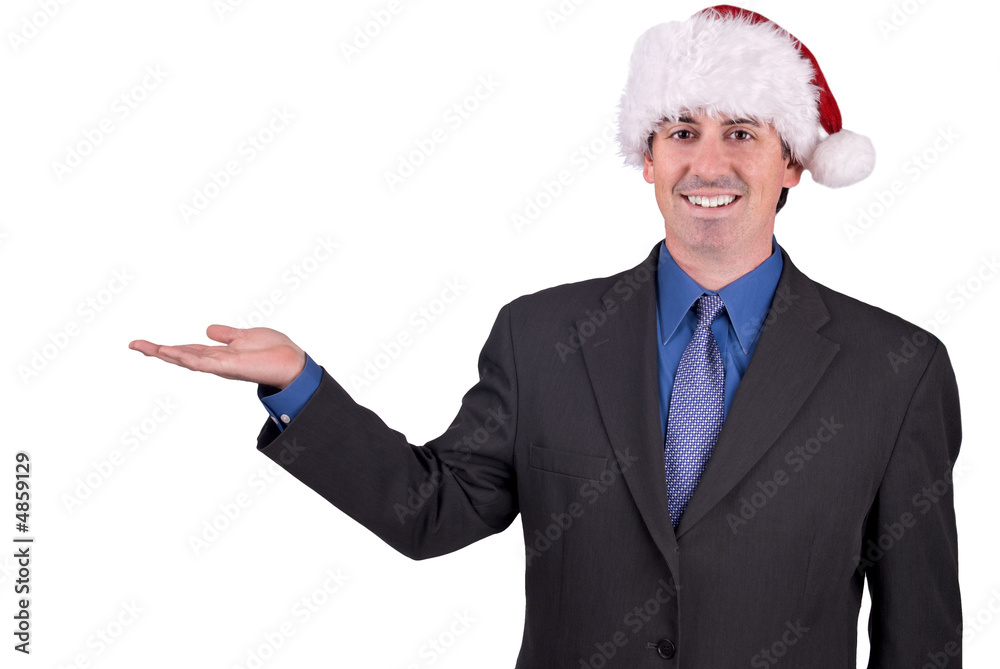 Businessman with open hand and Santa Hat