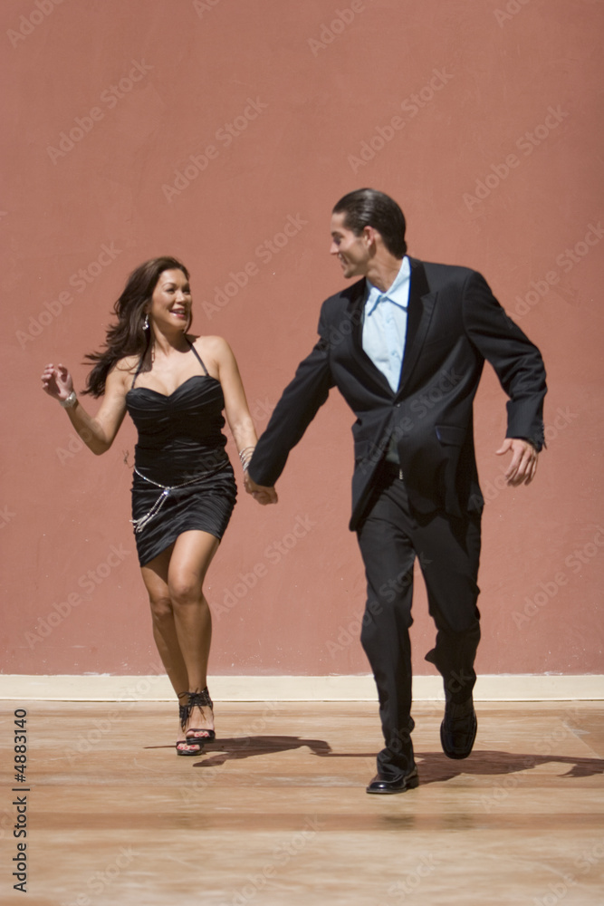 Fototapeta premium Happy couple running