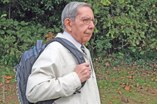 Retired man with rucksack