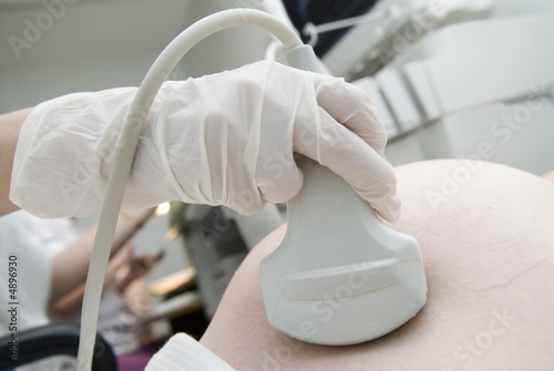 Scanning of a stomach of the woman