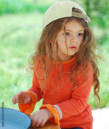 young kid girl with cap