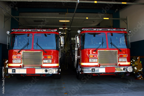 Fire station and two fire trucks