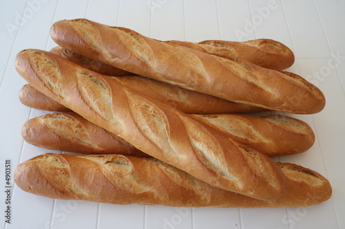 Several baguettes direct from the bakery photo