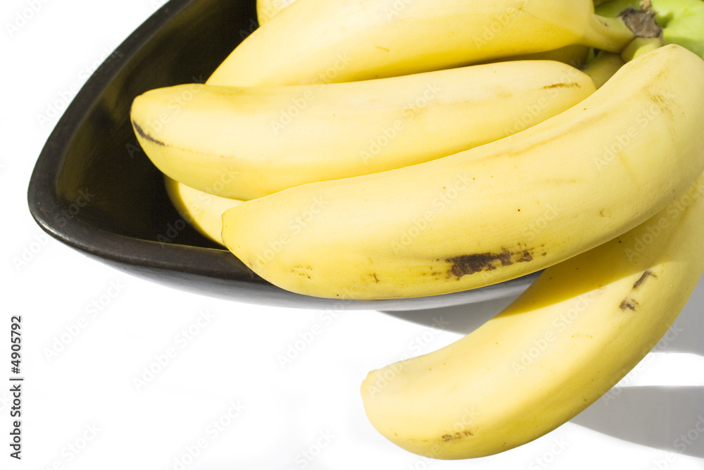 Bunch of bananas in blacc Japanese vase with white background 1 Bunch of bananas in blacc Japanese vase with white background 1