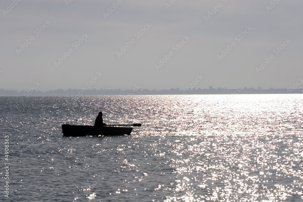 Obraz premium Silhouette of the fisherman