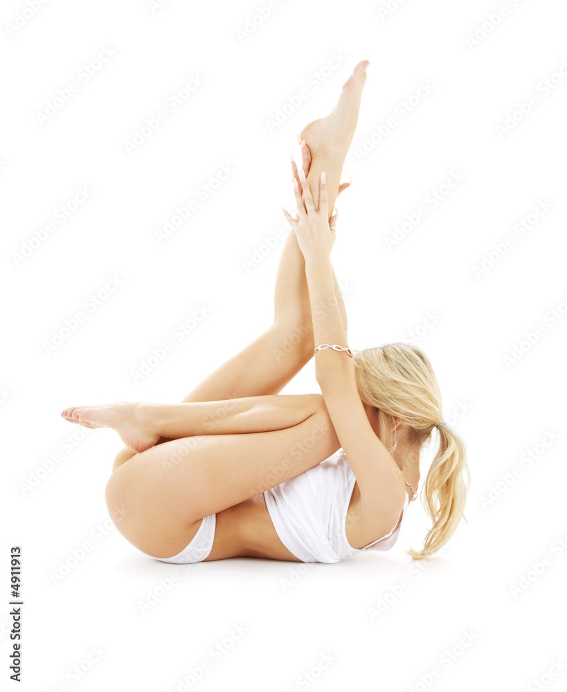 Fototapeta premium fit blond in white underwear practicing yoga