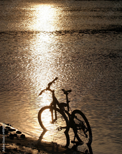 Bike silhouette in the river