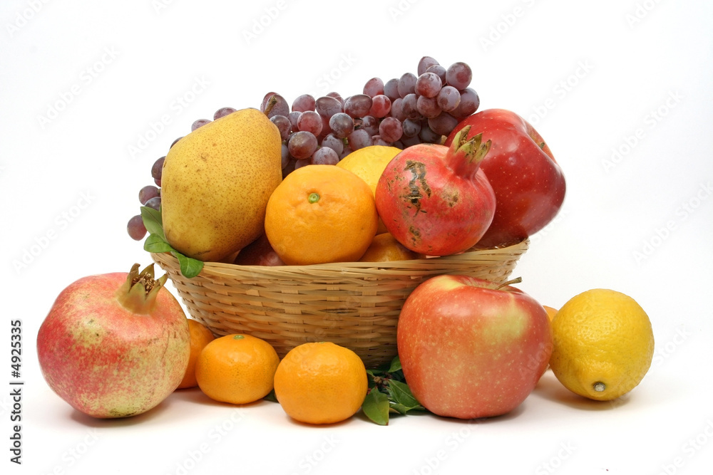 Mediterranean fruit basket isolated on white