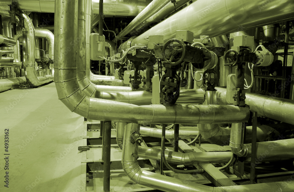Equipment, cables and piping as found inside of a modern industr Equipment, cables and piping as found inside of a modern industr