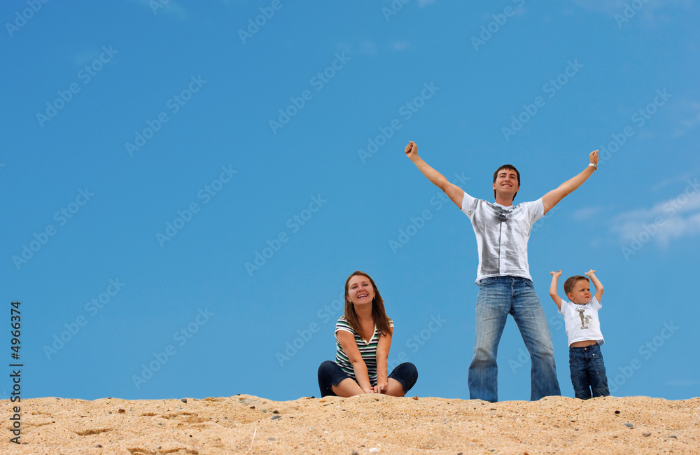 Happy three on top of sand dune