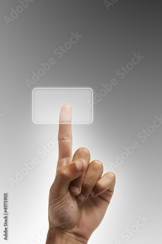 The hand presses the button