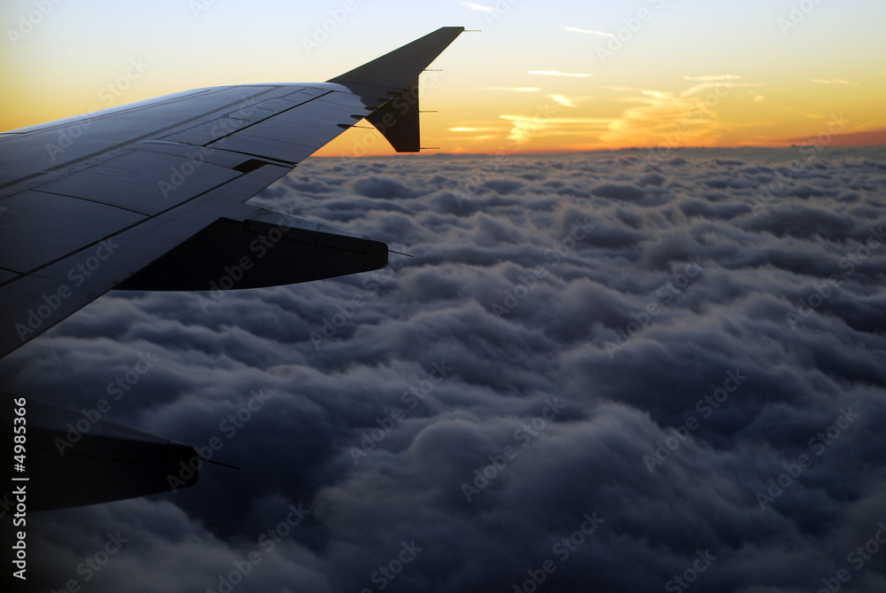 Obraz premium aircraft over clouds