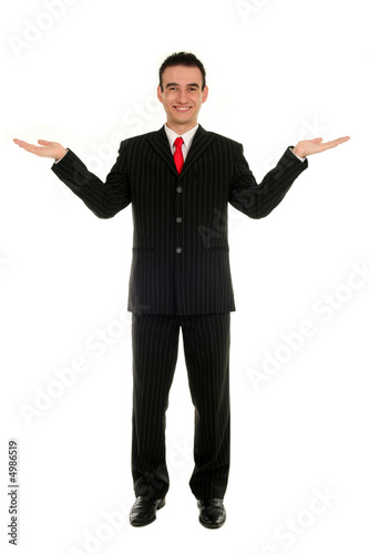 Businessman with arms raised