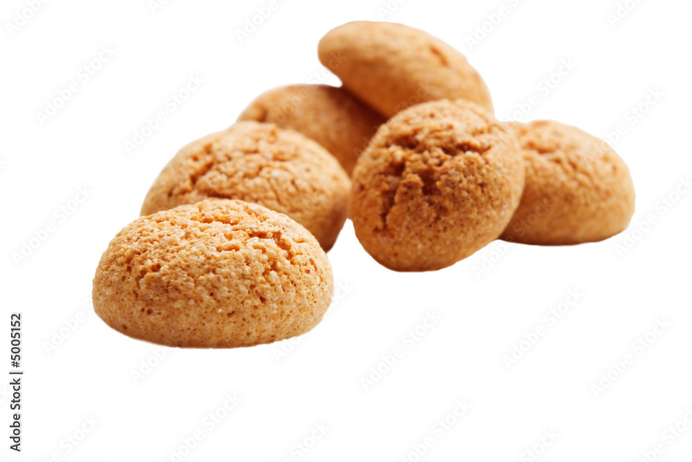 heap of italian amarettini cookies isolated on white heap of italian amarettini cookies isolated on white