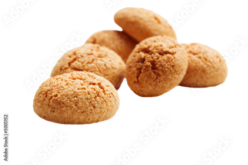 heap of italian amarettini cookies isolated on white