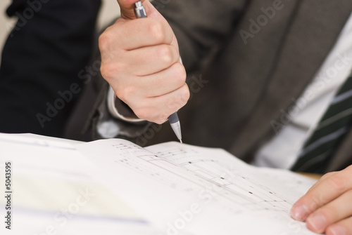 architects hand with a pencil