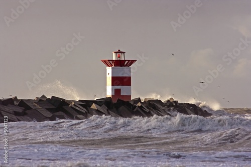 Fotografia Lighthouse at a storm in Holland
