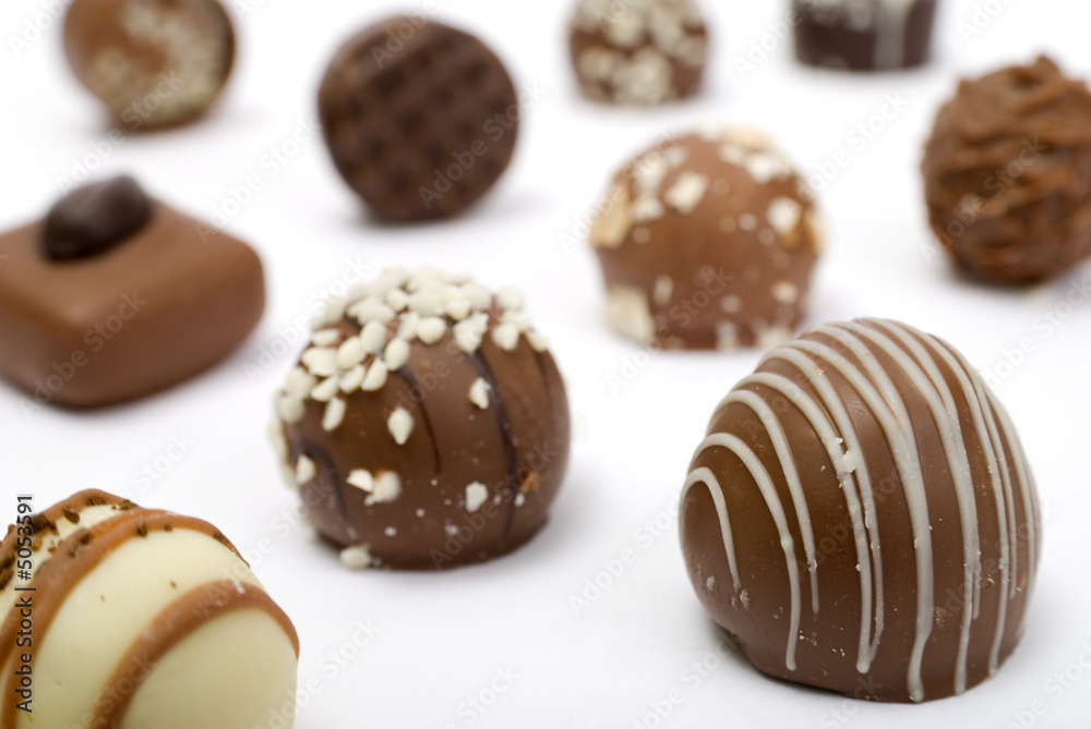 Group of variety of chocolates - focus on front right chocolate