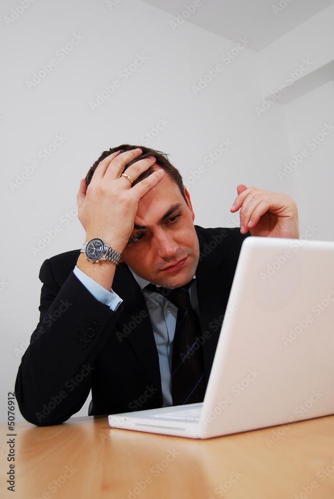 Businessman facing disaster Businessman facing disaster