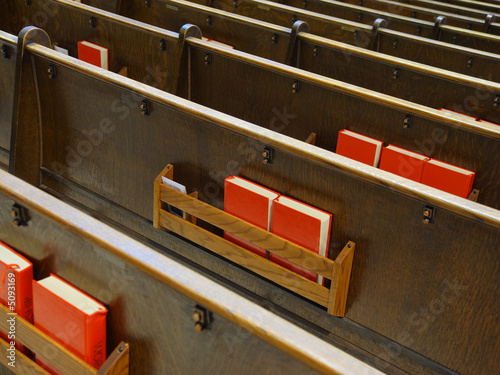 Catholic church benches and Bible books Fototapeta