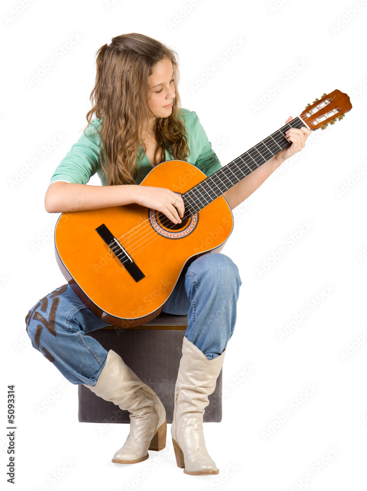 Young girl with guitar. Young girl with guitar.
