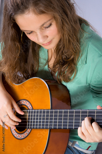 Young girl with guitar.
