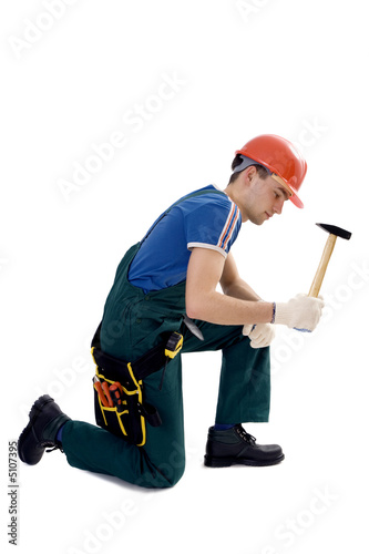 male construction worker in dungarees