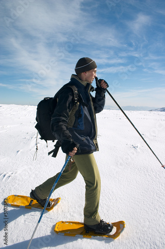tourist in winter mountains