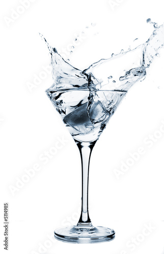 Splashing martini  toned in blue 