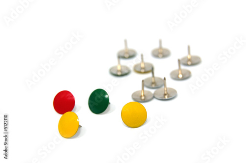 Coloured drawing pins isolated on white